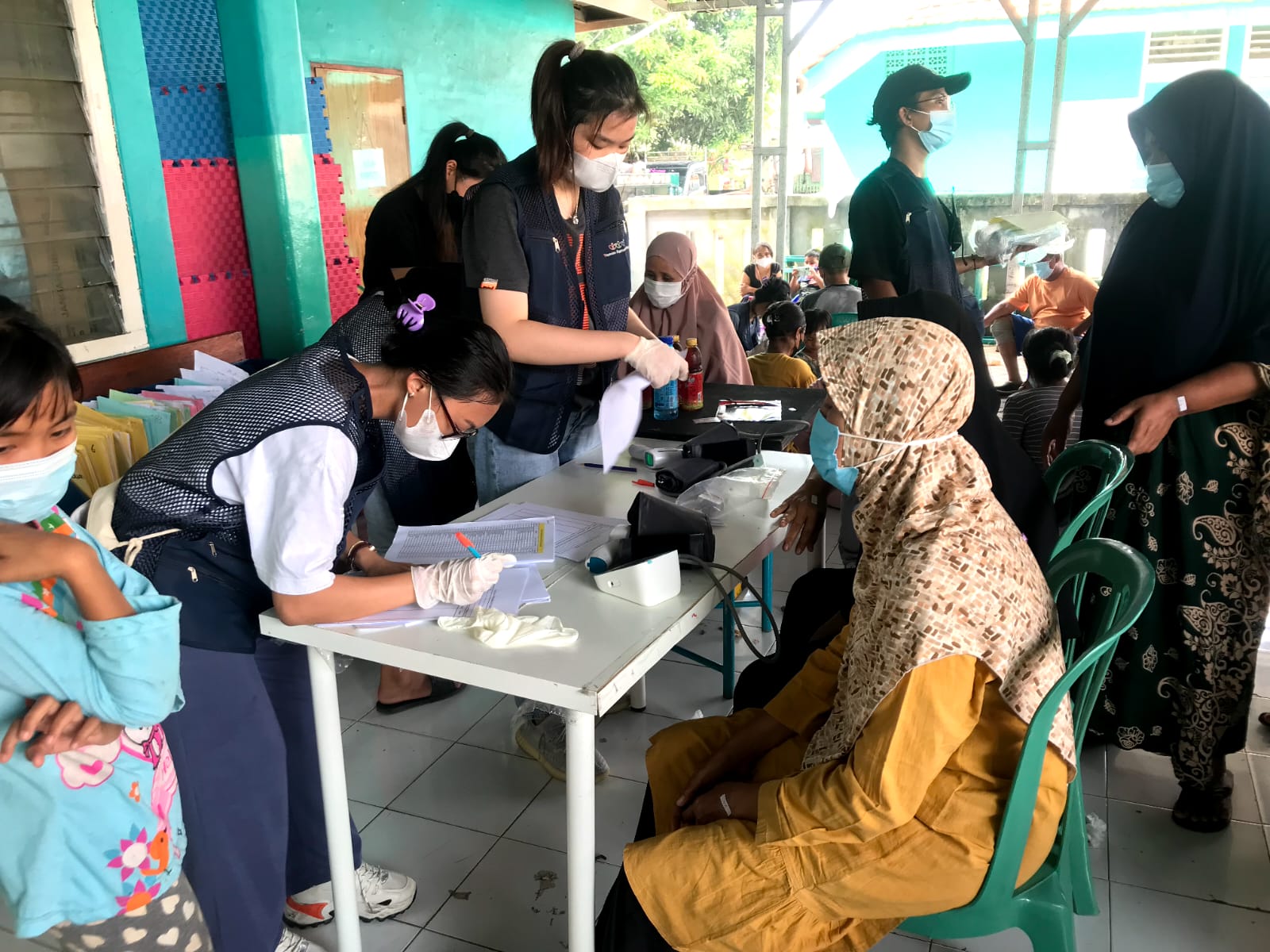 Meja pendataan pada hari kegiatan bakti sosial kesehatan